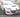 white mazda with lip