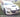 white mazda with lip