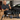 RIMiQ detailing spray and complete kit beside a car
