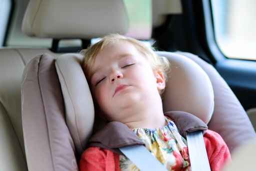 Kid Sleeping in Car